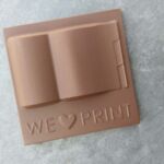 For this project we created a chocolate moulds as book and a logo on a small mini chocolate bar. Chocolate bar book